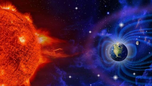 An illustration of the sun interacting with the Earth's magnetosphere.